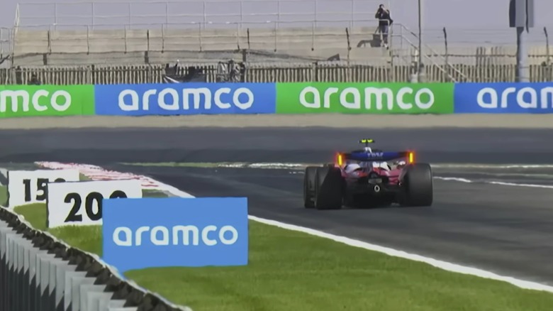 Ferrari SF-26 Formula 1 car driving down the Bahrain race track