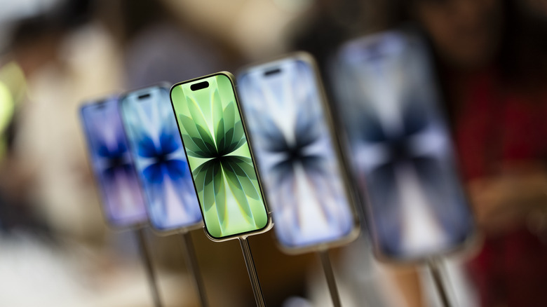 The iPhone 17 Pro models on display in a store.