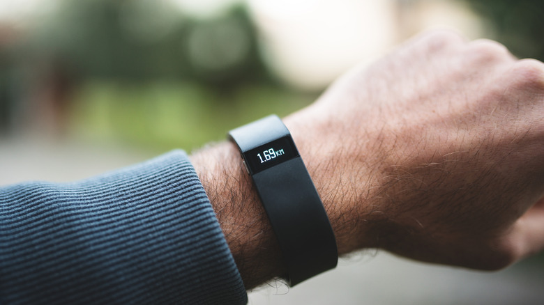 Fitbit Force on the wrist of a person working out