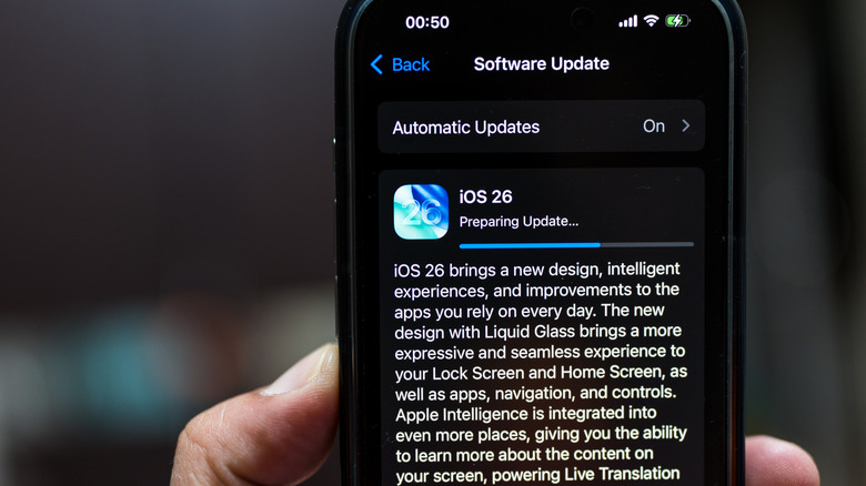 Apple iOS 26 software update being downloaded on an iPhone
