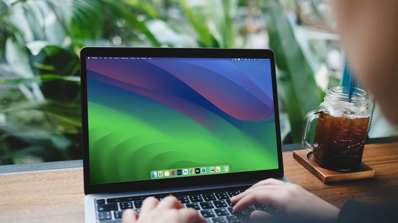 A picture of someone using MacBook