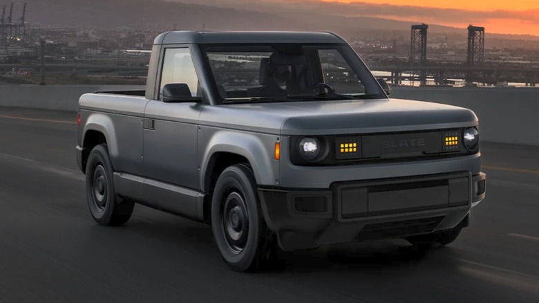 Blank Slate electric truck driving down highway at sundown