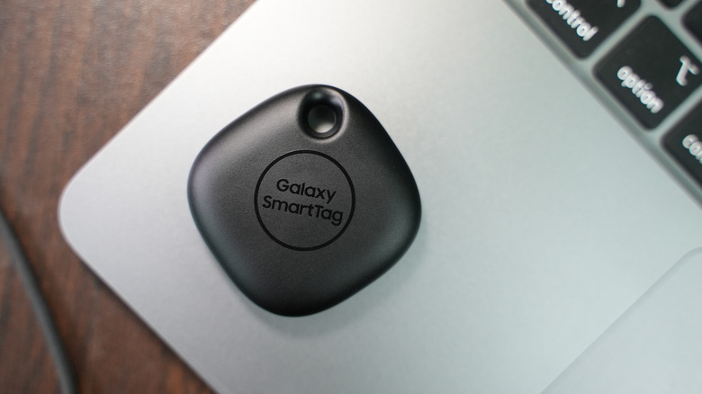 Close up of a Samsung Galaxy SmartTag device on a laptop