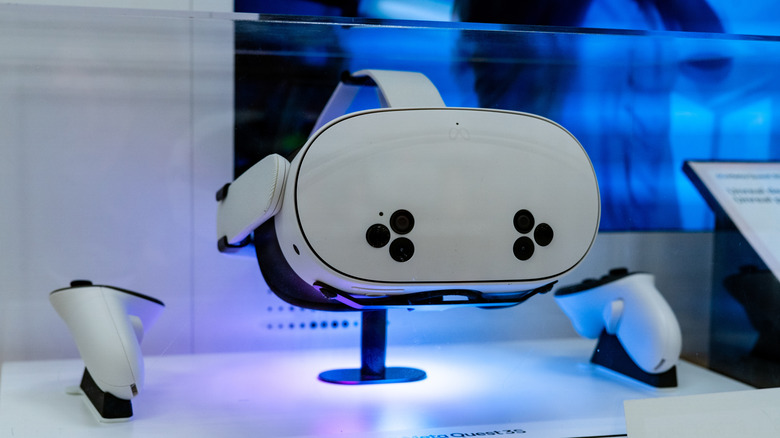 The Meta Quest 3S VR headset with its controllers on display.