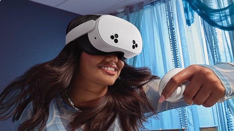 A woman wearing the Meta Quest 3S virtual reality headset.