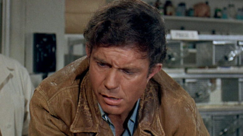 Charly (Cliff Robertson) hunched over in "Charly."