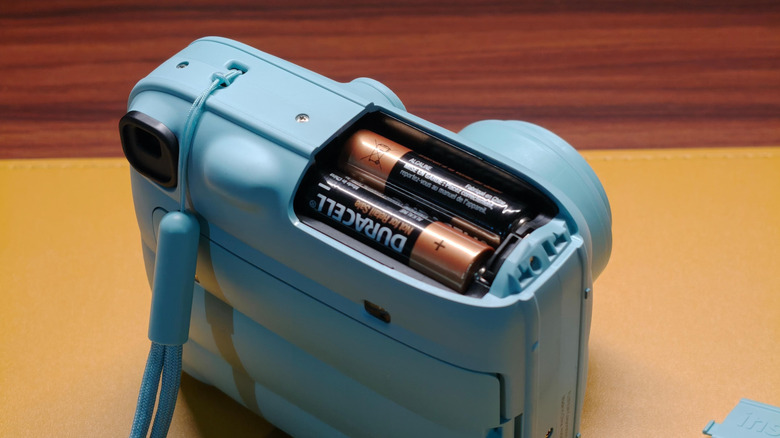 Closeup of the Fujifilm Instax Mini 13's battery compartment
