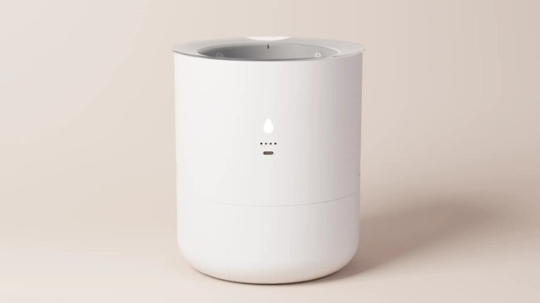 White LeafyPod smart planter with a cylindrical design and water indicator.