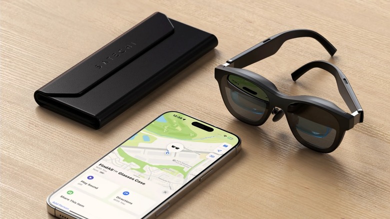 Satechi FindAll Glasses Case on a wooden surface next to a pair of glasses and an iPhone