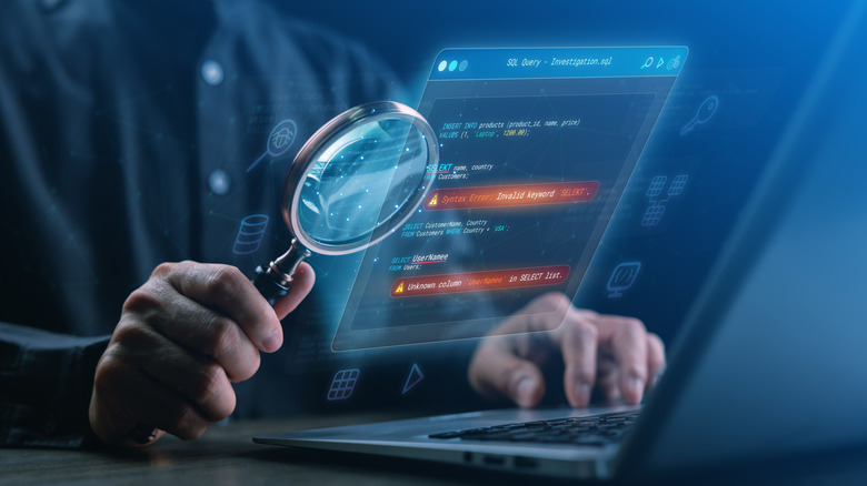 Person holding a magnifying glass over a laptop keyboard, with a holographic display showing SQL code and error messages about invalid syntax and unknown columns.