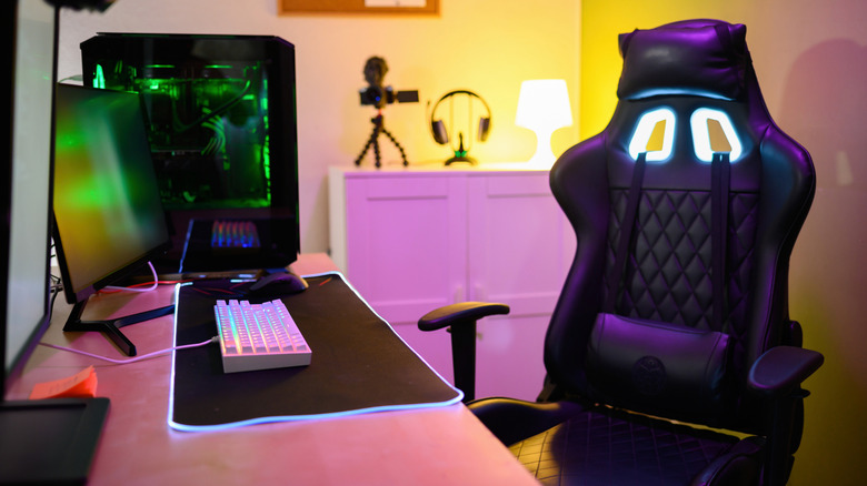 Modern gaming chair in an office and in front of a desk with a PC