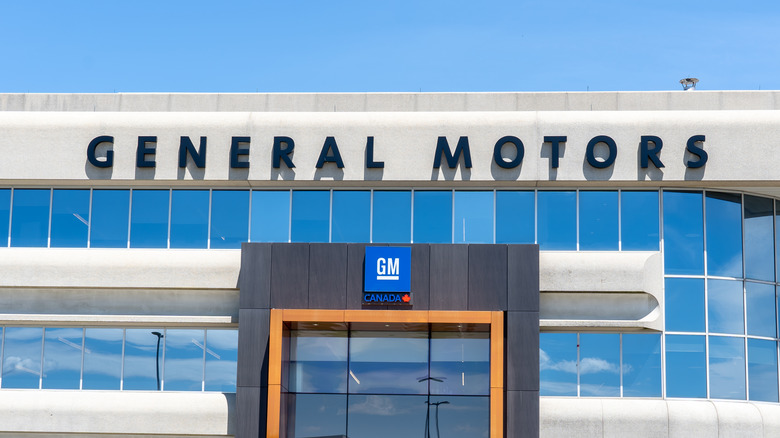GM building front with GM logo and General Motors sign