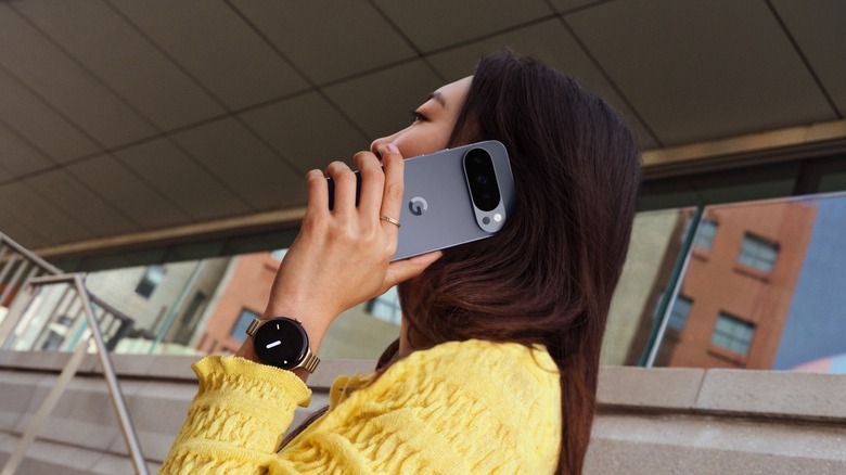 A person using the Pixel 10 Pro.