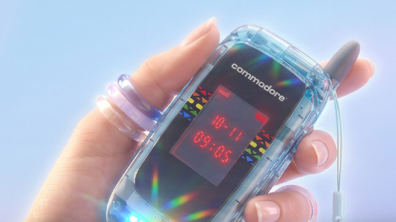 The Commodore Callback Starlight Edition being held up, sparkling in the sunlight