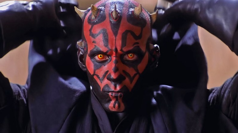 Darth Maul (Ray Park) removing his hood in "Star Wars: Episode I: The Phantom Menace."