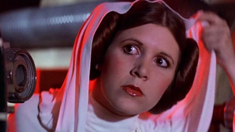 Leia (Carrie Fisher) grabbing her hood in "Star Wars: Episode IV -- A New Hope."