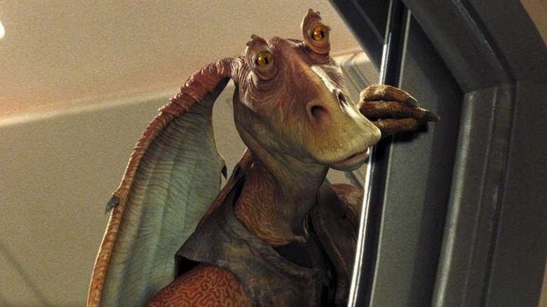 Jar Jar Binks (Ahmed Best) peeking through a door in "Star Wars: The Phantom Menace."