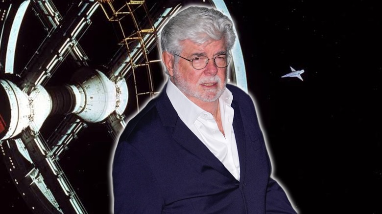 George Lucas in front of the space ship from 