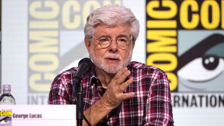 George Lucas speaking on stage at Comic Con