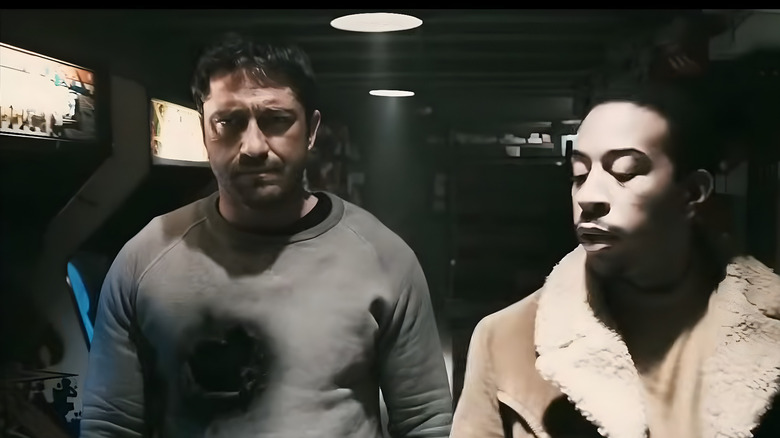 Kable (Gerard Butler) walking next to Brother (Ludacris) in "Gamer."