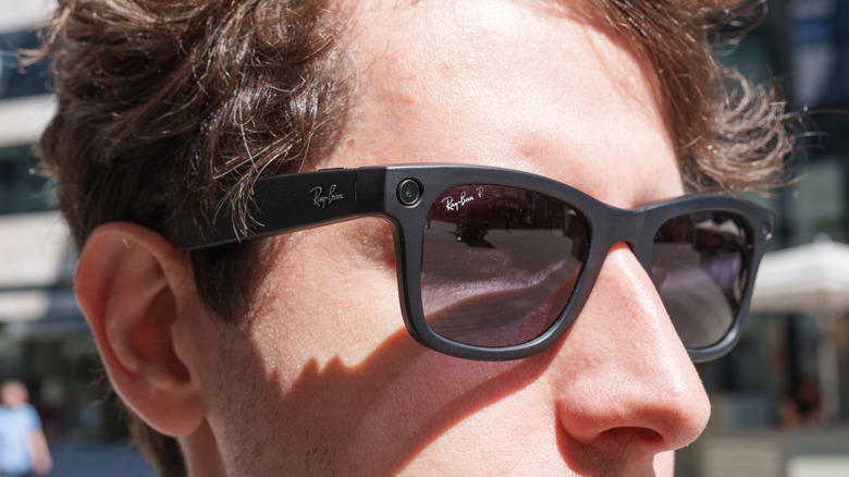 Person wearing Meta Ray-Ban sunglasses.