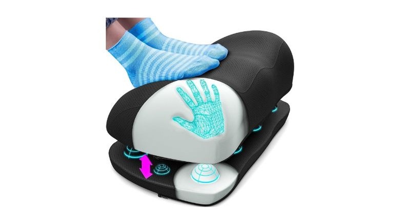 A person's feet resting on Everlasting Comfort's Adjustable Footrest