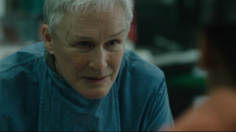 Dr Caldwell looking worriedly at Melanie