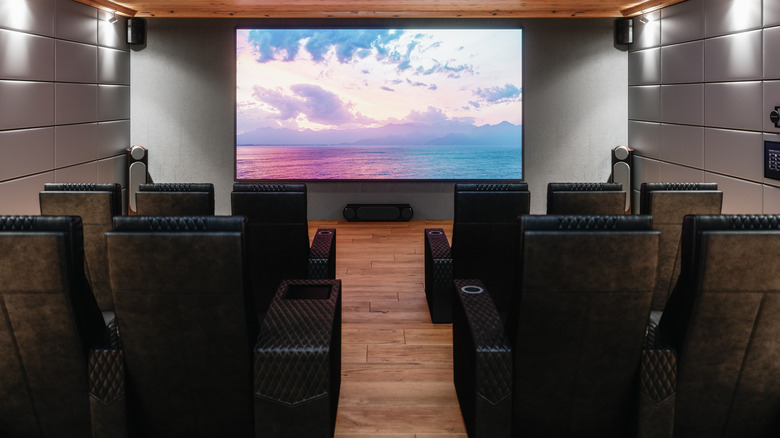 high end display on the wall in a home cinema room