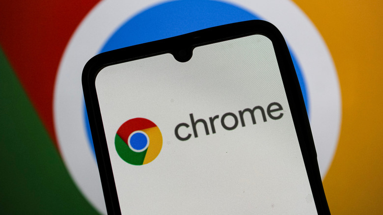 The Google Chrome logo is displayed on a phone.