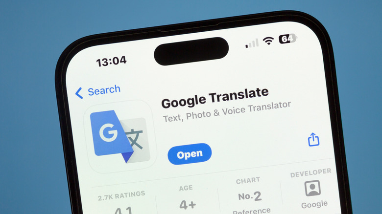 A closeup of a computer rendered cellphone displaying Google Translate in the Apple App Store