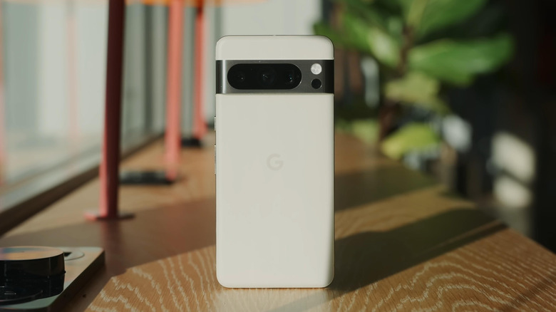 A Google Pixel 8 Pro smartphone standing vertical