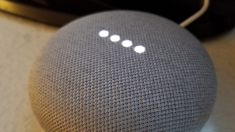 lit up google home speaker in use