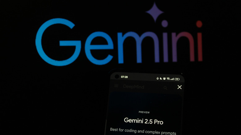 Google Gemini on a desktop screen with Gemini showing on a phone screen in forefront
