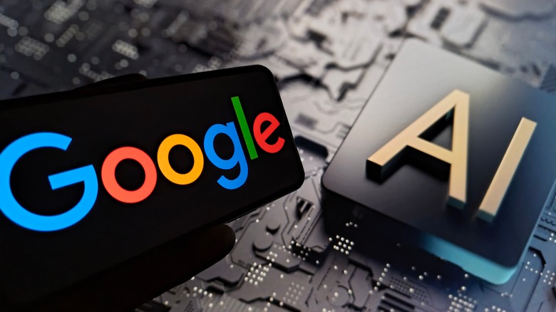 The Google logo on a phone next to a display showing an AI concept image.
