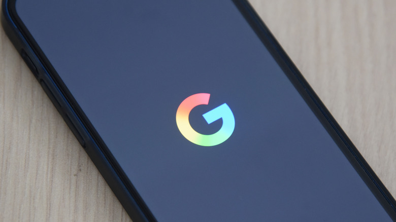 Google logo on phone screen, google app loading up