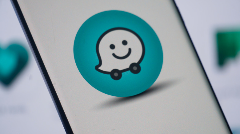 Waze emoji icon on a smartphone screen.