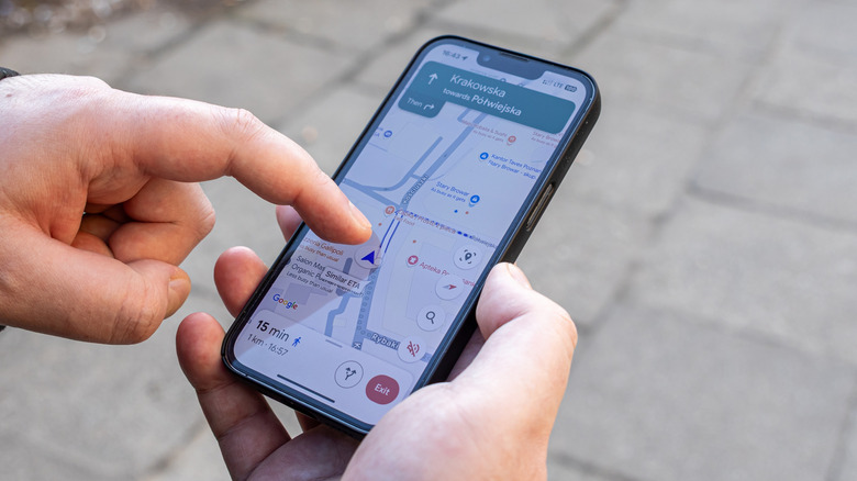 person using google maps for directions to walk somewhere