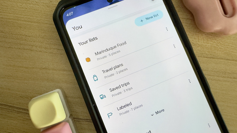Phone showing Google Maps lists and labeled list