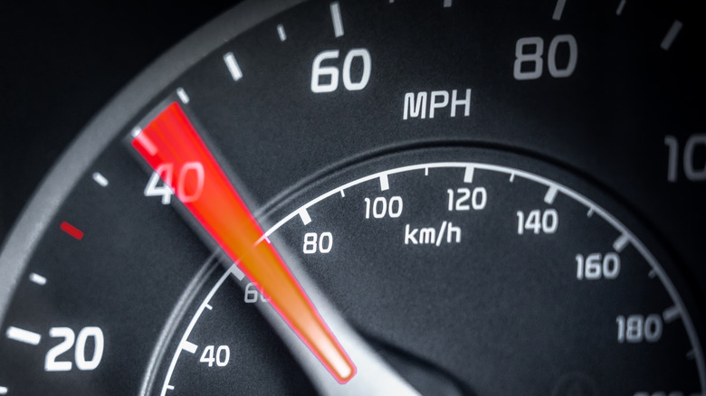 Speedometer with needle at 40 miles per hour and climbing.