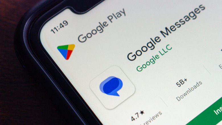 close-up of smartphon showing google messages app store listing
