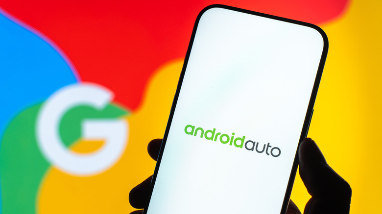 Android Auto logo on the screen of a smartphone