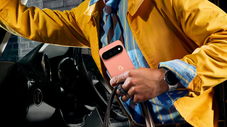 Pixel 11 Pro XL being held by a person coming out of a car