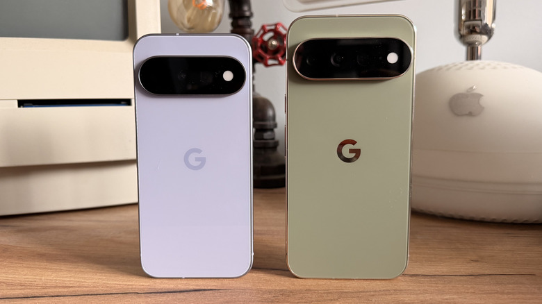 Pixel 11 and 11 Pro XL stood next to one another on sideboard