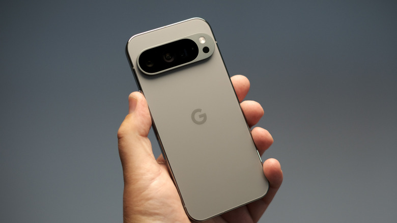 A person holding onto a Google Pixel phone