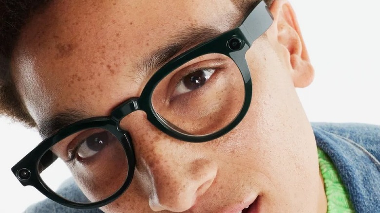 Google's Warby Parker smart audio glasses worn by model.