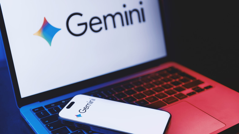 Google Gemini logo visible on smartphone and laptop displays with red and blue hue.
