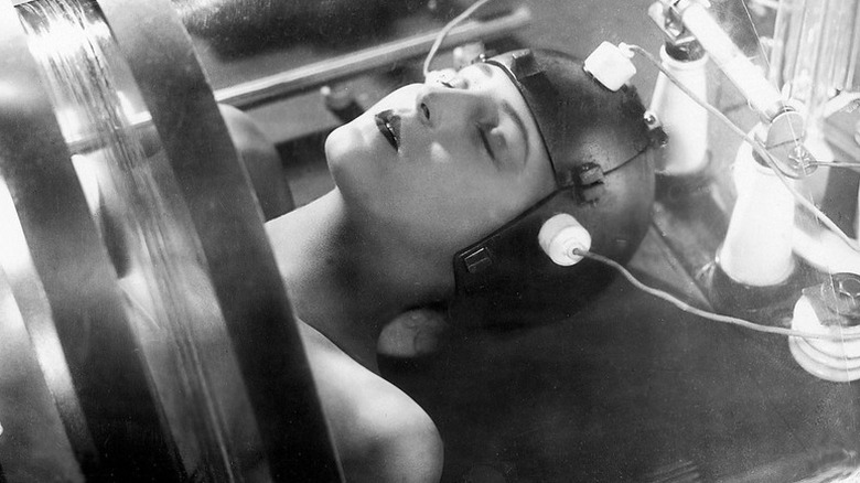 Maria (Brigitte Helm) lying on a laboratory table in "Metropolis."