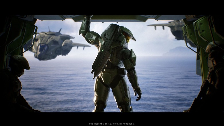 Master Chief looking backwards over his shoulder out of a Pelican in Halo: Campaign Evolved