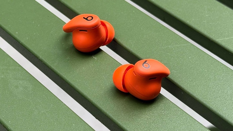 A close up of the Powerbeats Fit earbuds