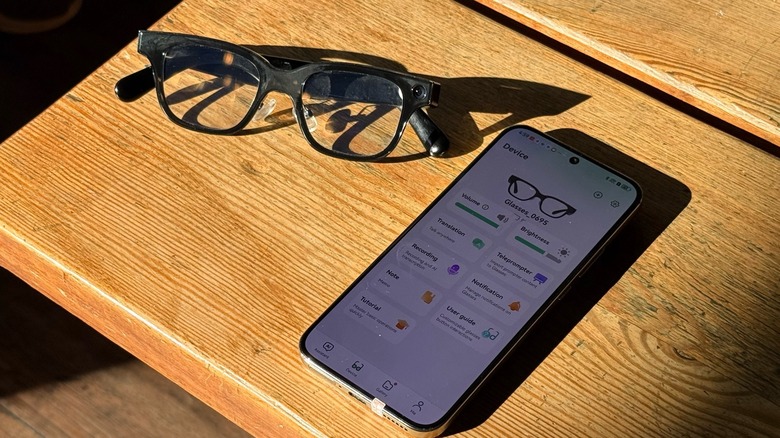 Rokid Glasses and their companion app on a smartphone